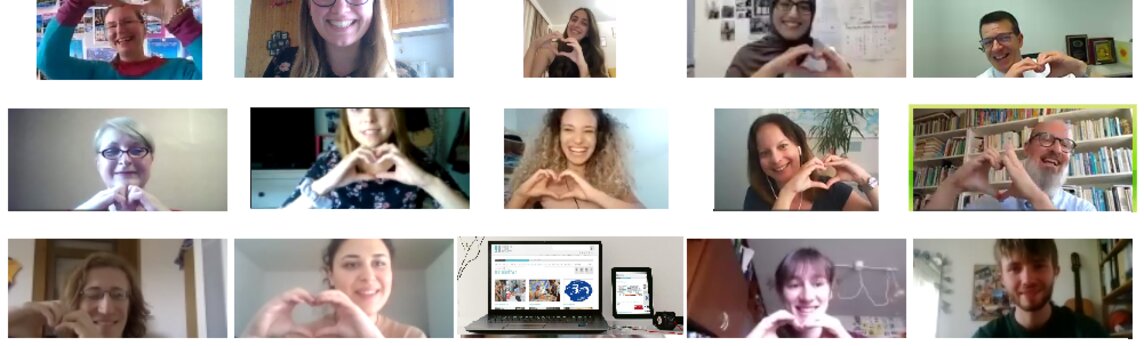 Students making hearts with their hands in a video session